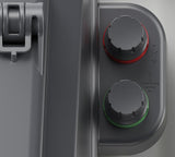 Close-up of a Patriot SG2000 with two control knobs, one red and one green, on a gray background.