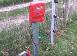 SPEEDRITE 1000 Fence Charger on electric fence post at farm running on a battery